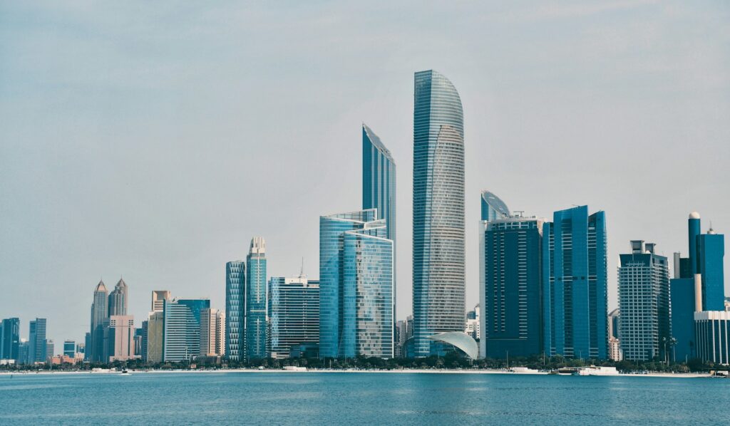 The Abu Dhabi skyline and financial district towers seen across the water