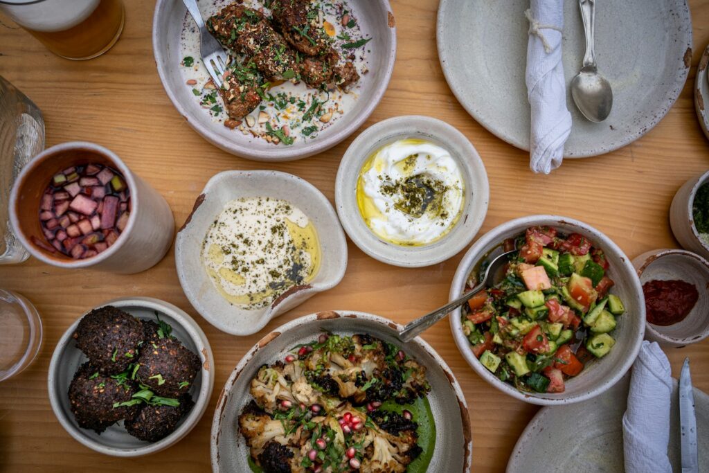 A mezze table laid for sharing, closer to the capital’s register than Dubai’s party brunches
