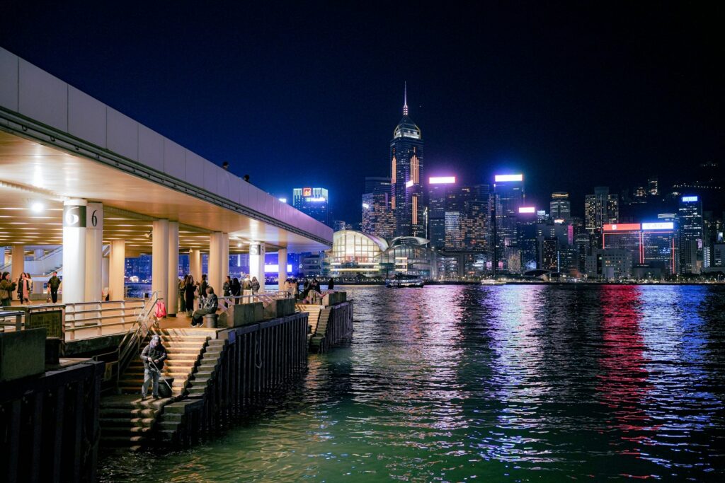 Hong Kong's illuminated skyline reflected in the water at night