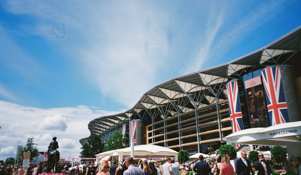Grandstand and crowd at Royal Ascot racecourse on Gold Cup day