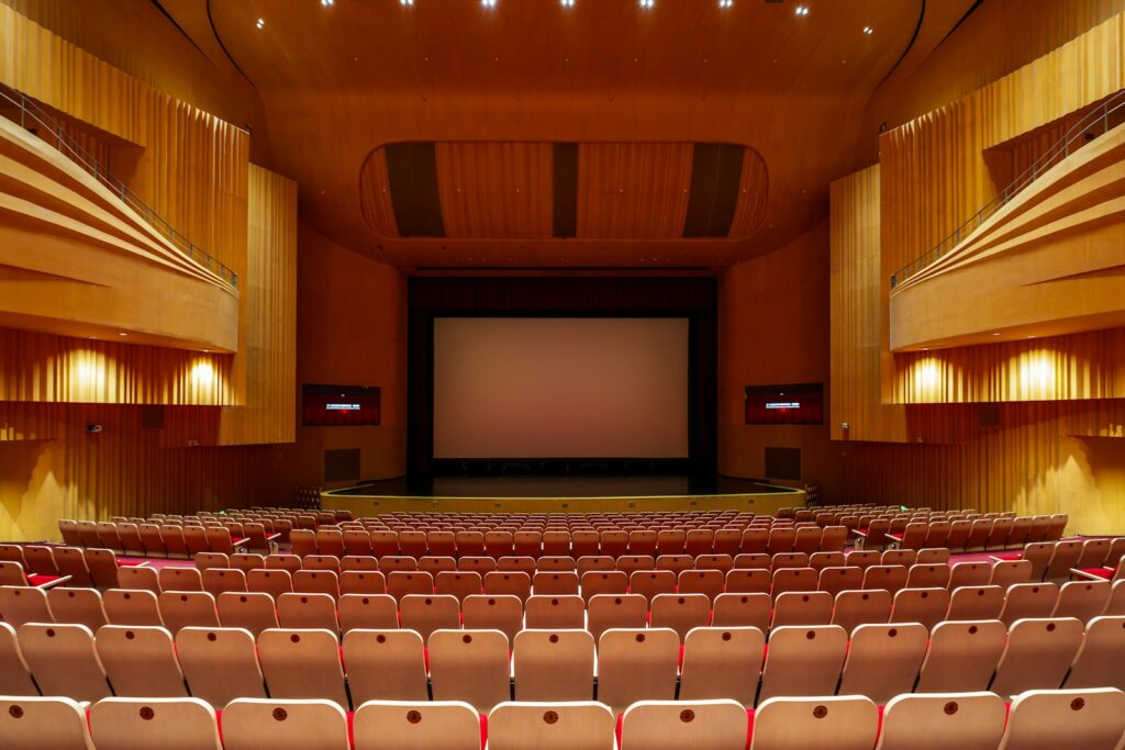 Empty cinema auditorium and screen before a festival screening