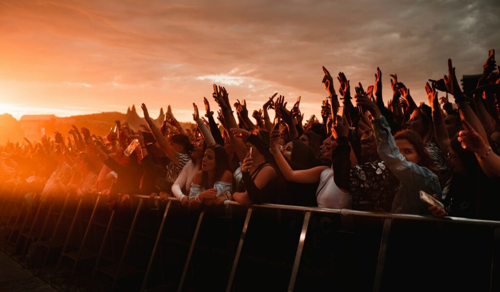 Crowd in front of the main stage at sunset at Coachella 2027 in Indio, California