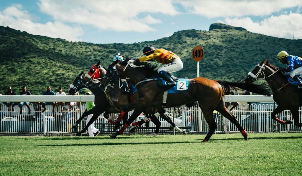 Field of three-year-olds racing at Epsom Derby