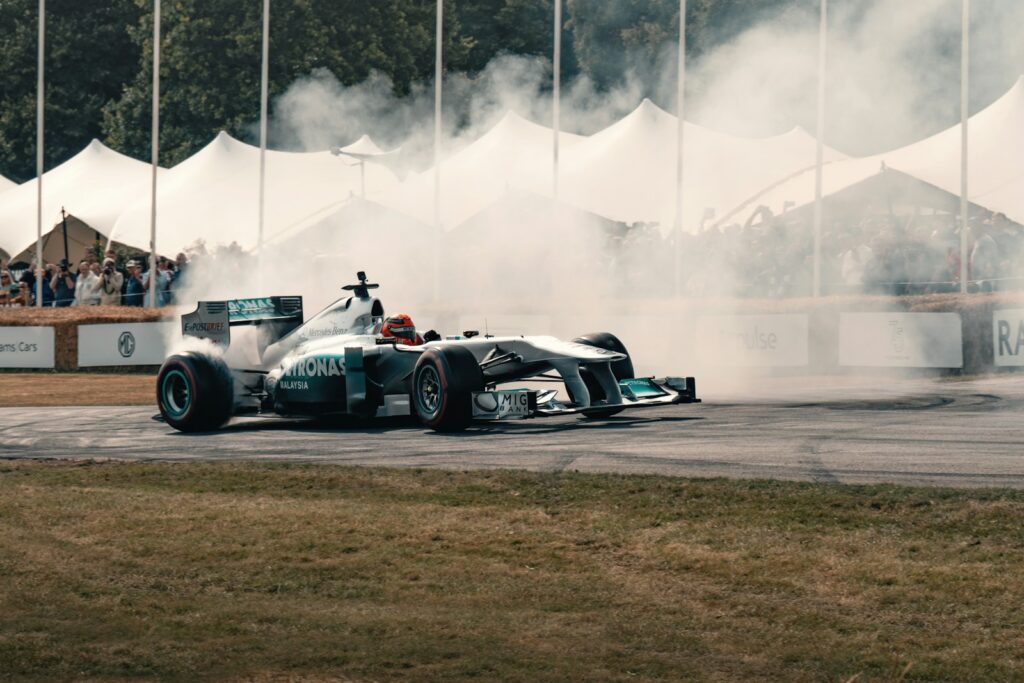 Driver at speed during a race session — Perfect.Live
