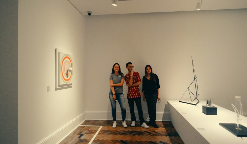 Visitors viewing contemporary art in a gallery