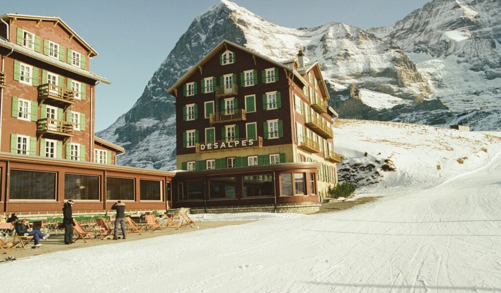 Hotel in the car-free village of Wengen with the Eiger rising behind it