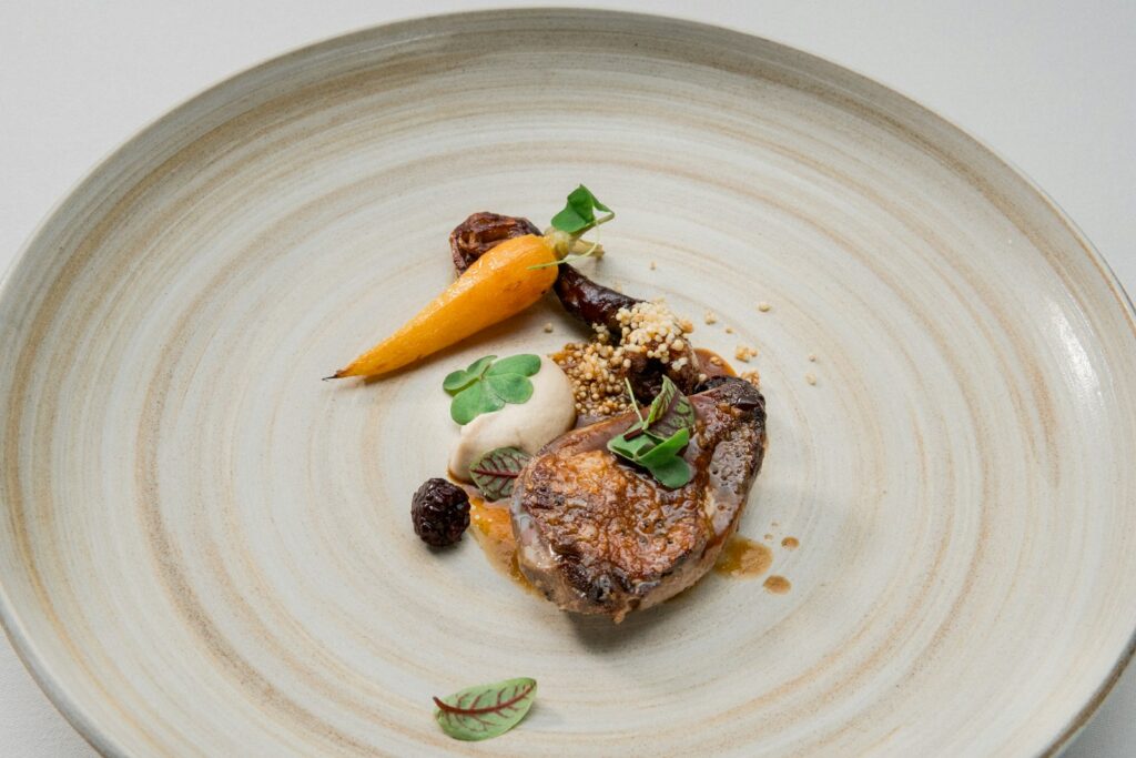 A plated tasting-menu course of the kind served across London’s starred kitchens