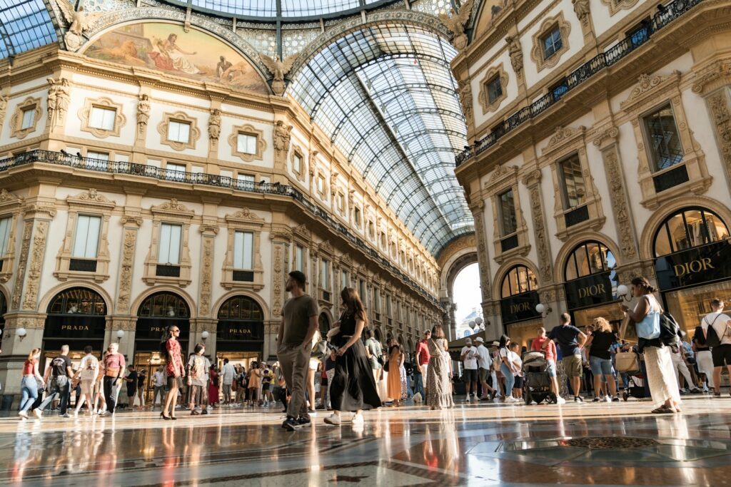 Shoppers inside a grand Milan arcade — Perfect.Live