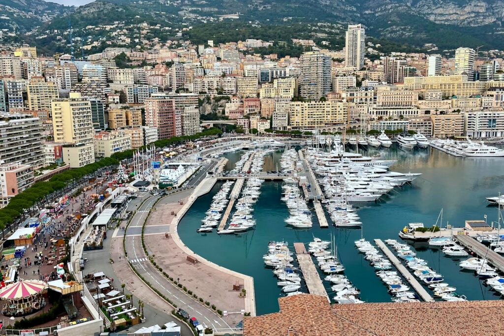 Monaco harbour full of yachts beside the city