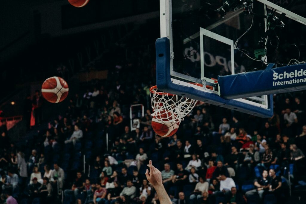 Crowd watching a basketball game from the stands — Perfect.Live