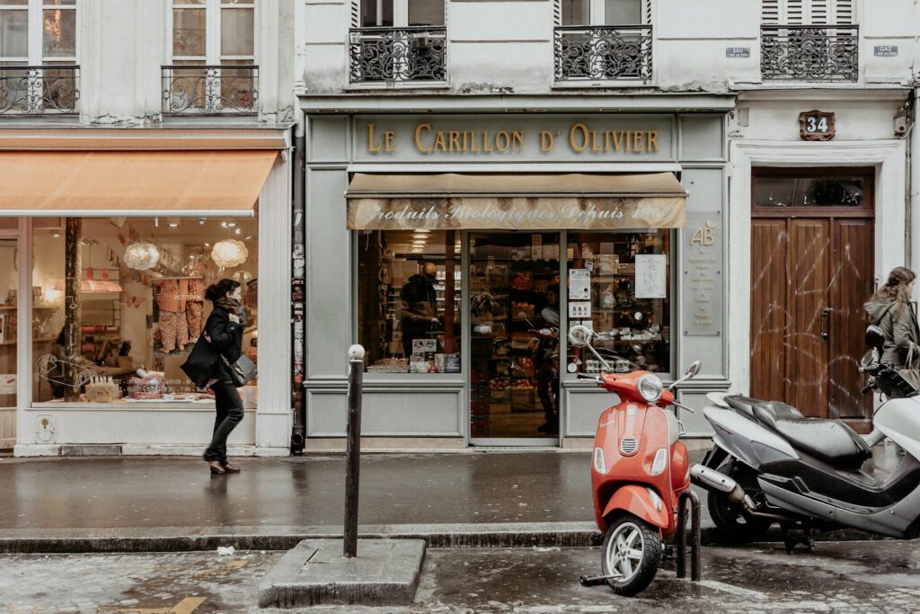 Parisian boutique storefront on a quiet street near Avenue Montaigne