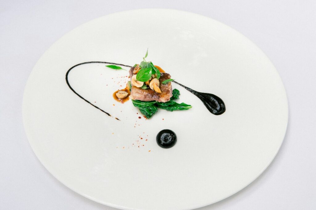 A plated course of the kind served across the Paris starred dining rooms