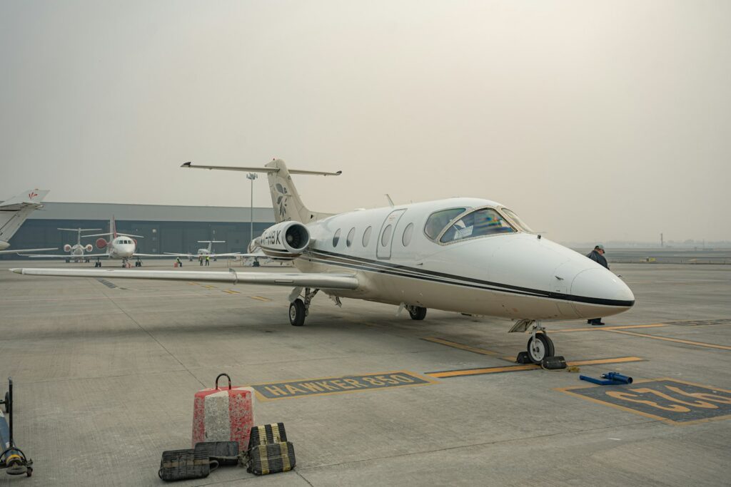 A private jet on the tarmac, reflecting record cross-border relocation among high-net-worth families