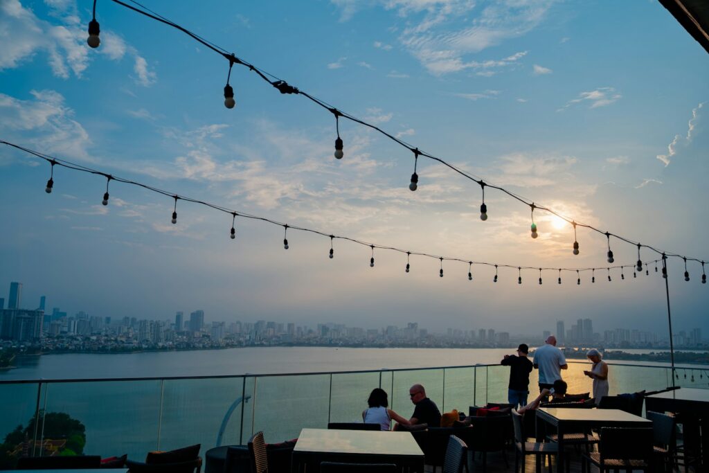 A terrace table at sunset, the slot that books out first on every rooftop in the city