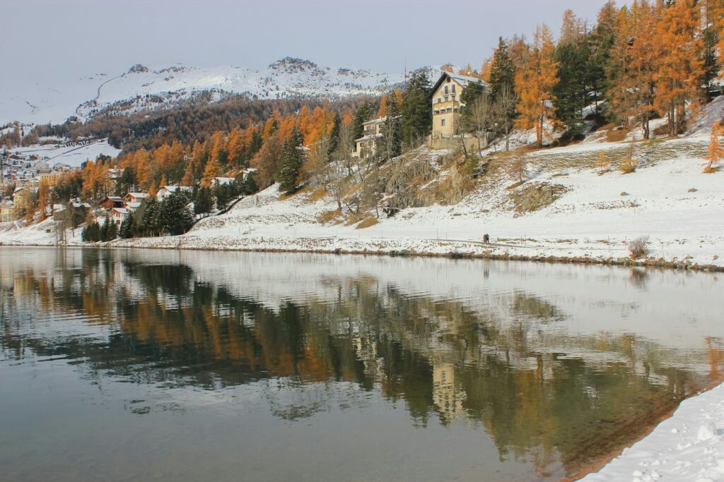 Snow-covered shore of Lake St Moritz in the Engadin valley