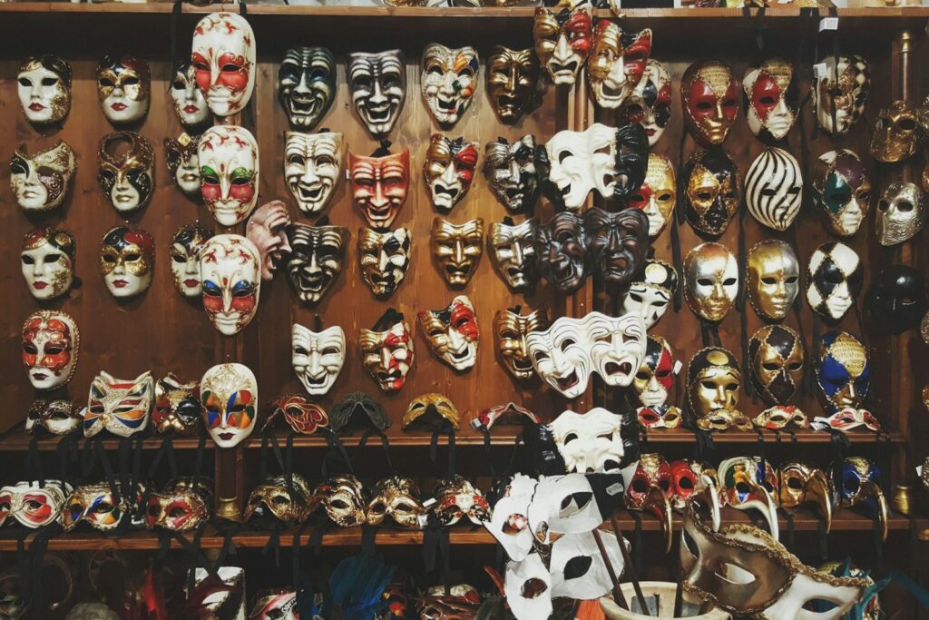Hand-made Venetian masks displayed in a mask atelier
