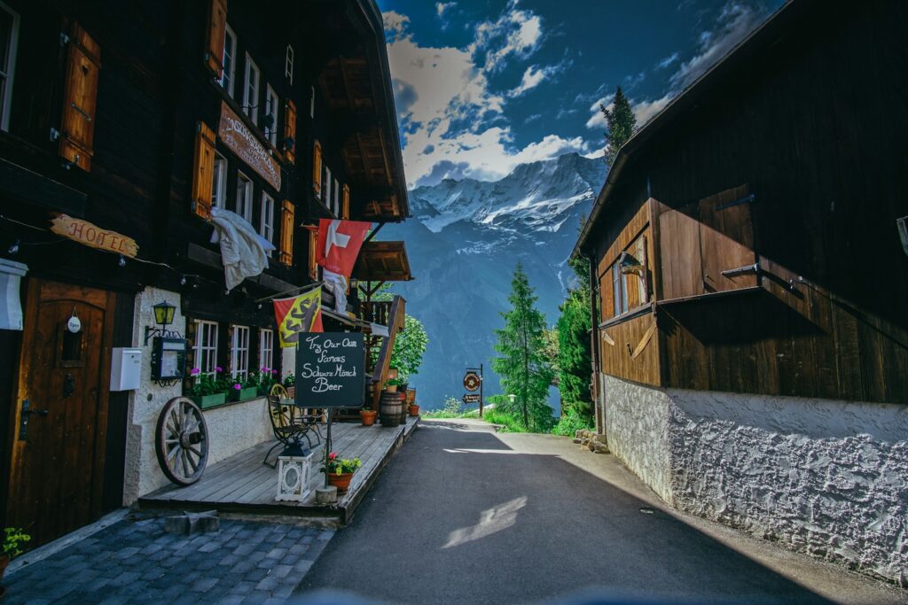 Traditional Swiss chalet village street in the Valais