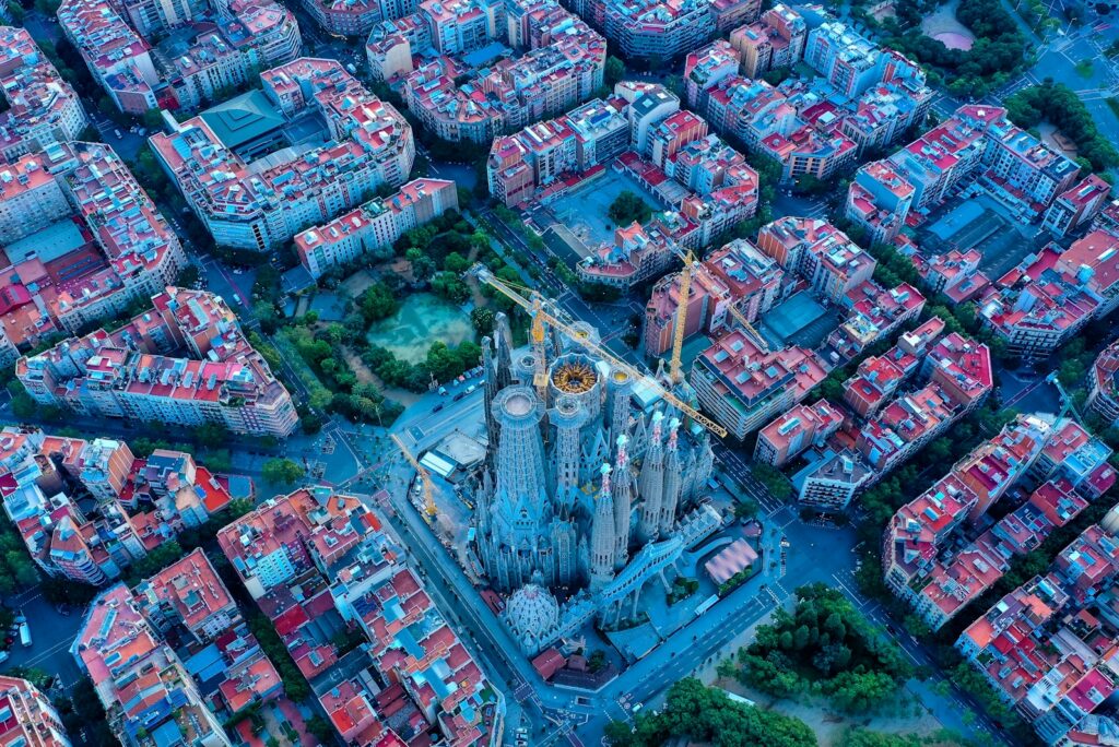 Aerial view of the Eixample grid in Barcelona with the Sagrada Família