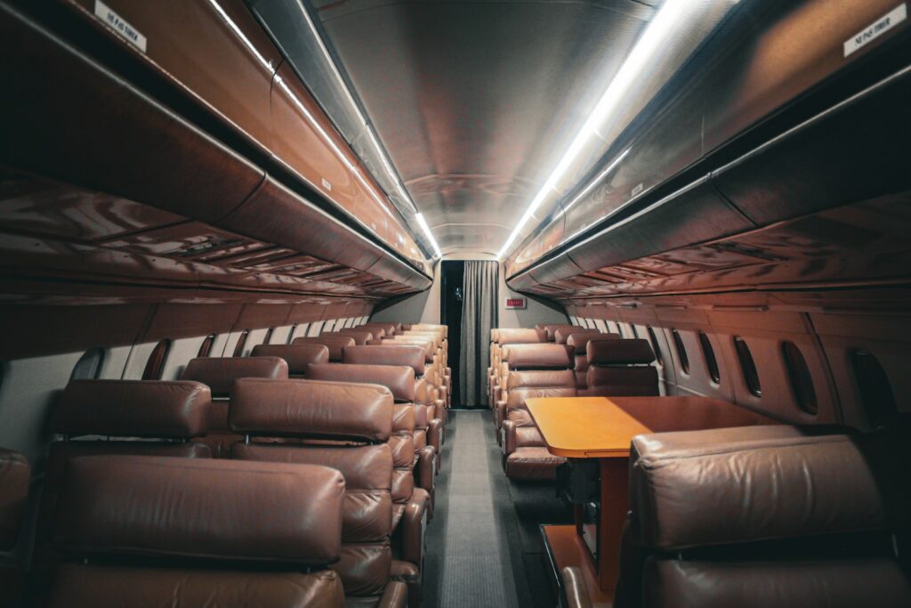 Quiet private aircraft cabin aisle at night