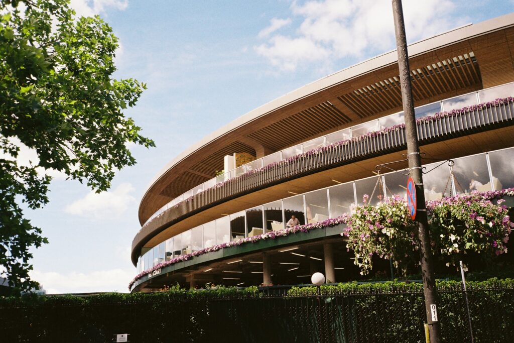A tiered grandstand pavilion at a major tennis venue