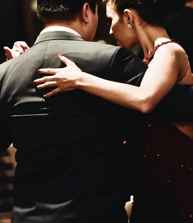 Couple dancing at a private evening event
