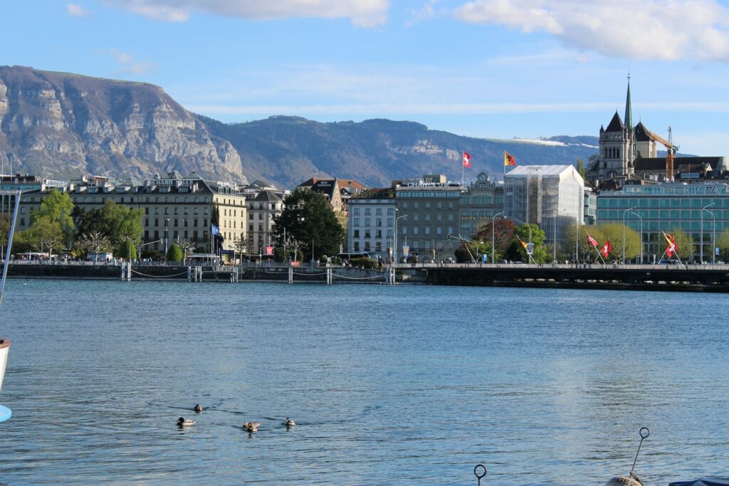 Geneva's lakefront skyline with mountains behind