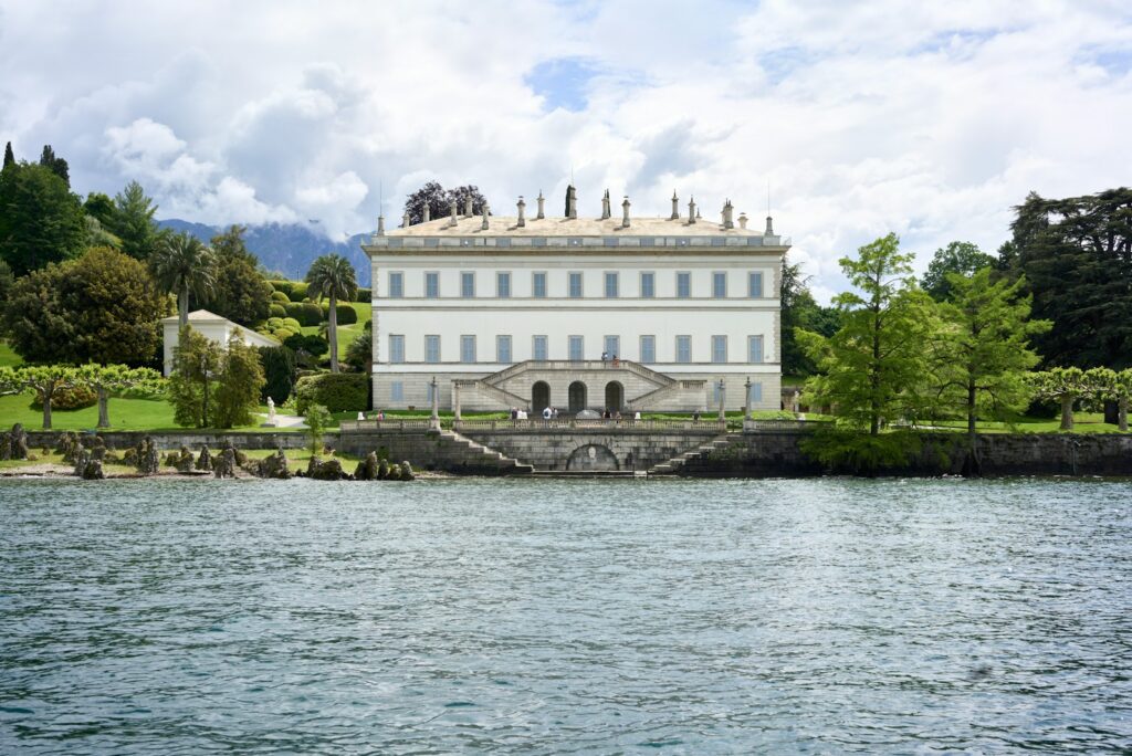 A neoclassical villa and its gardens on the Lake Como shoreline