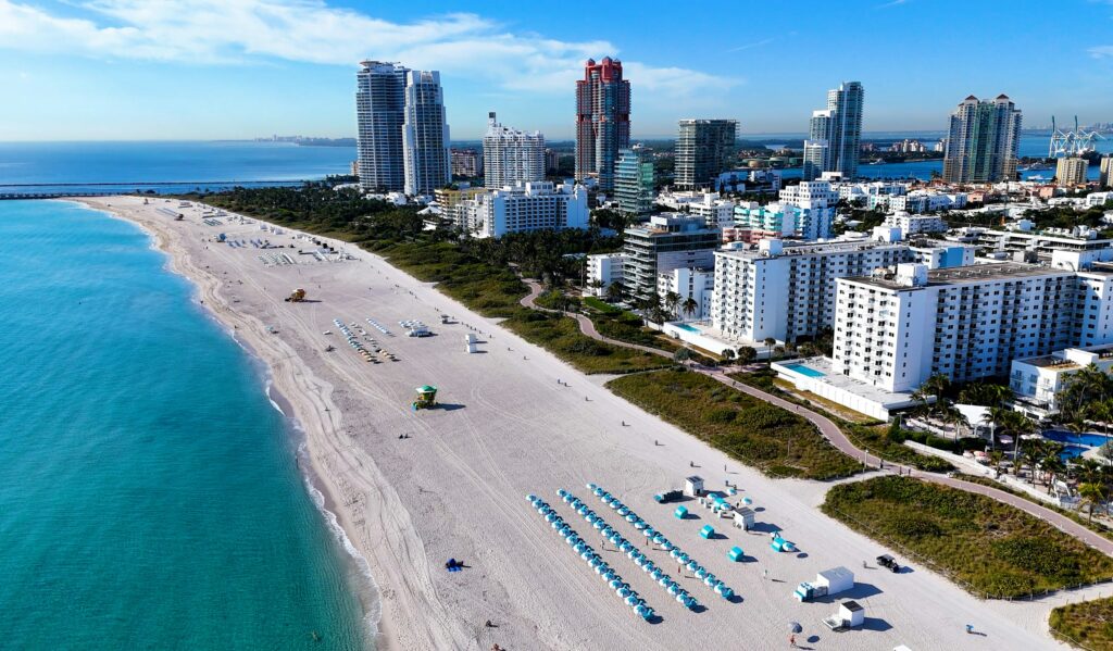 South Beach shoreline and hotel towers from above, luxury hotels in Miami Beach