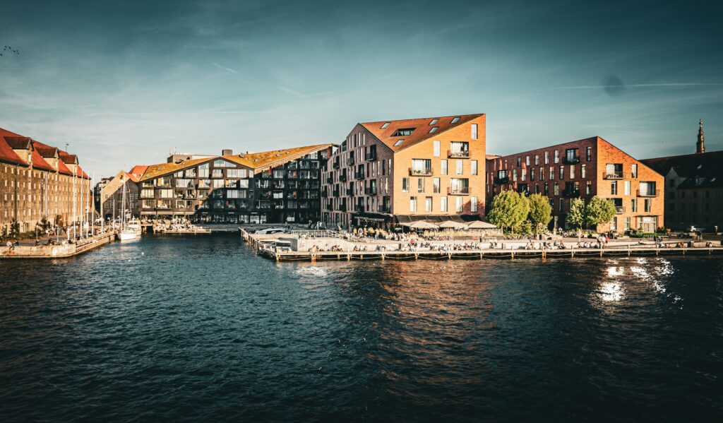 Copenhagen canal waterfront at golden hour, home of the Michelin star restaurants Copenhagen is known for