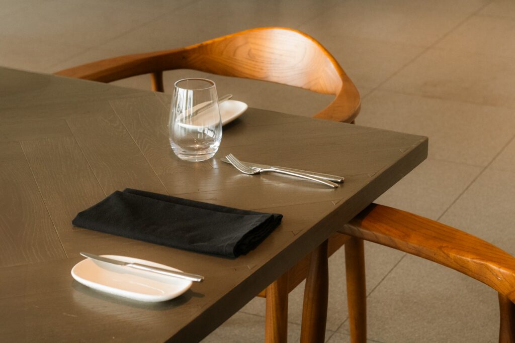 A minimalist restaurant table set for a reservation