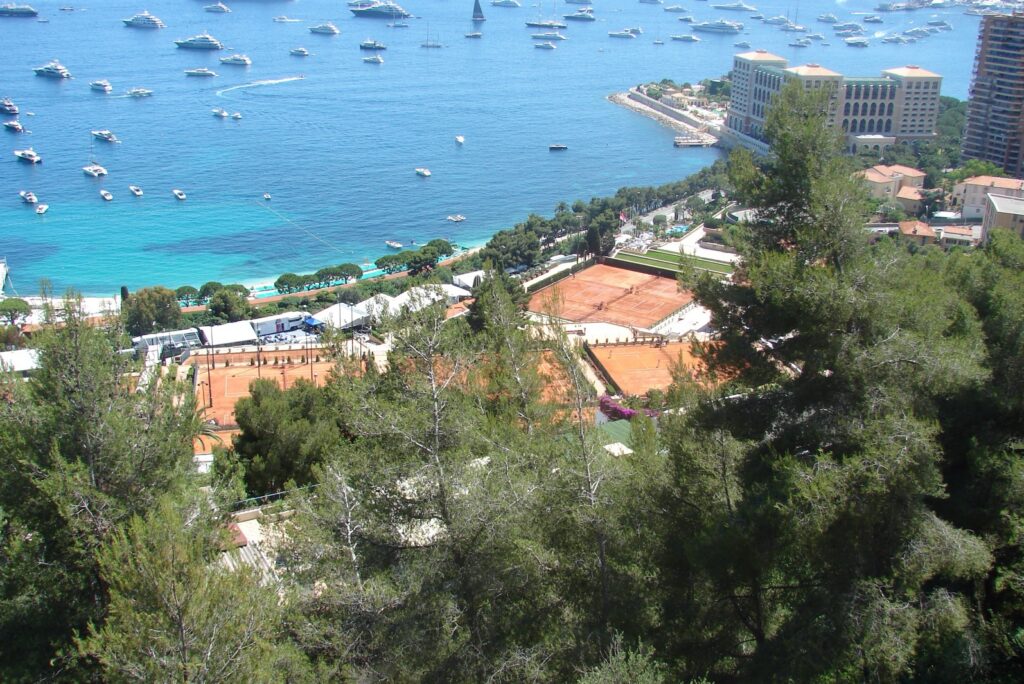 Clay courts of the Monte-Carlo Country Club above the bay of Monaco