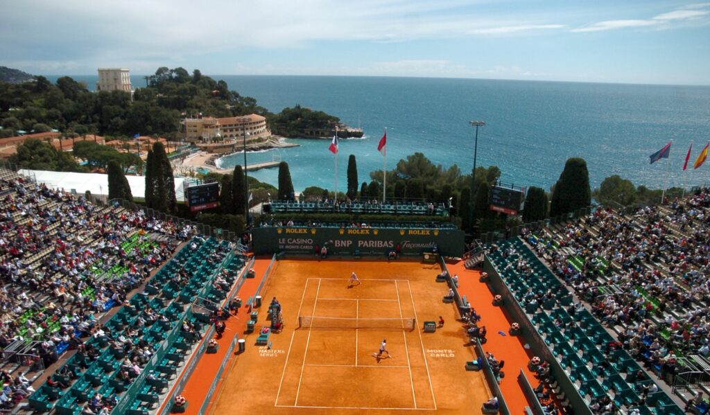 Clay courts of the Monte Carlo Masters with the Mediterranean behind the stands