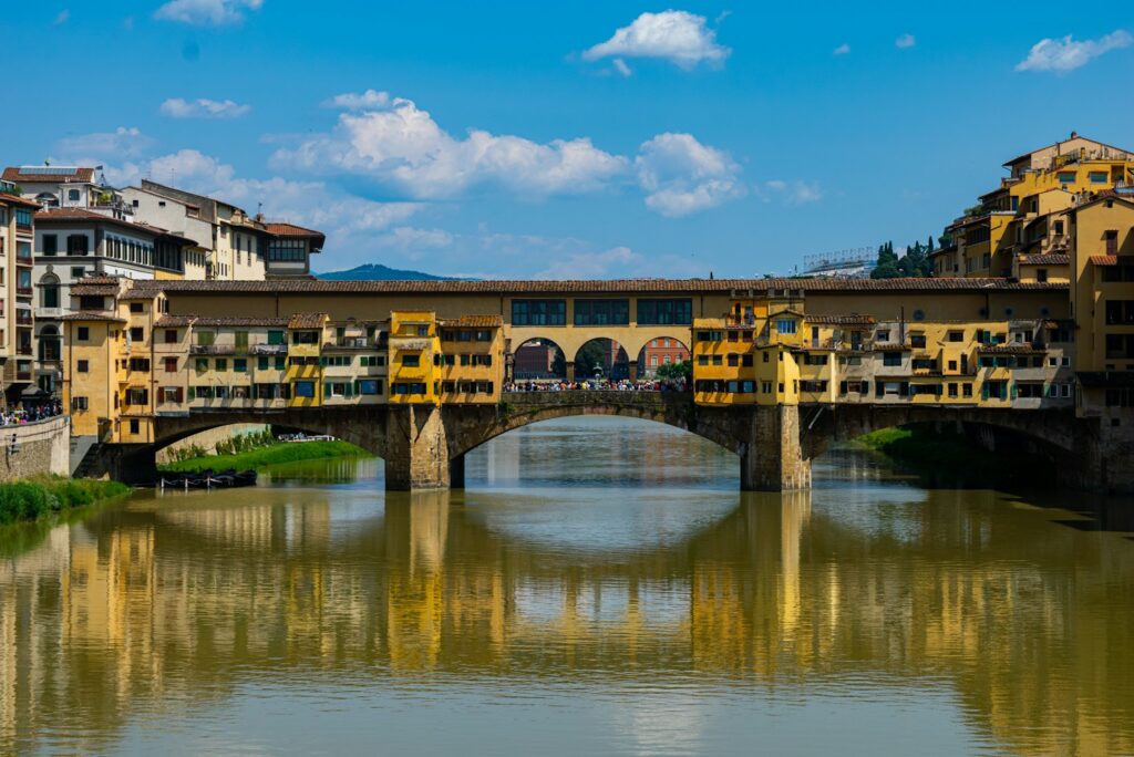 Ponte Vecchio reflected in the Arno in Florence