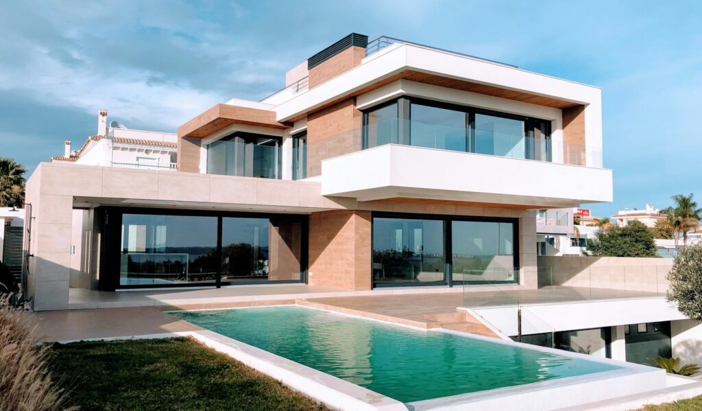 Relocation concierge — a modern villa with a pool, ready for a family arriving abroad | Perfect.Live