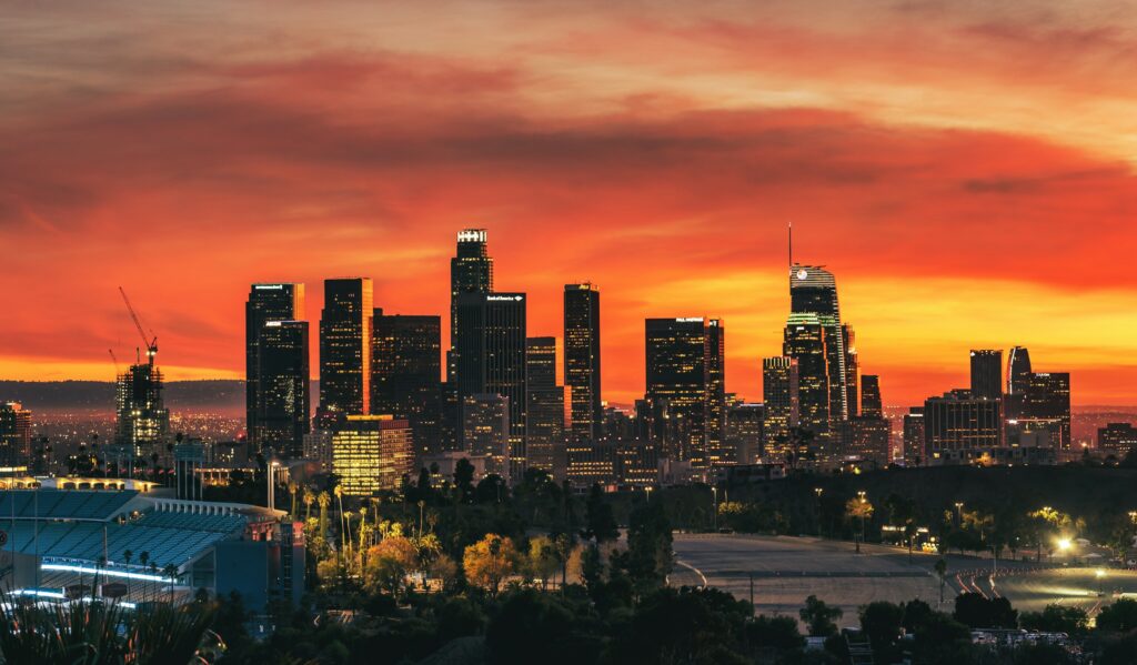 Sunset over the Downtown skyline, the view that draws visitors to rooftop bars Los Angeles