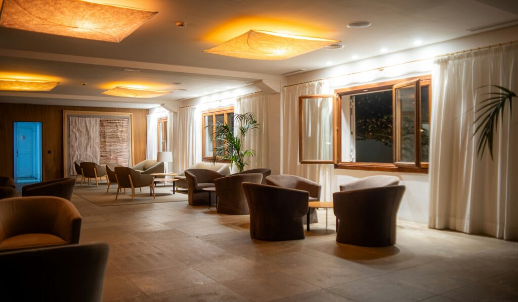 How to find a trustworthy luxury concierge — a quiet hotel lounge with armchairs and soft light