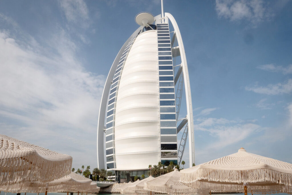Burj Al Arab seen across the beach umbrellas at Verde Beach