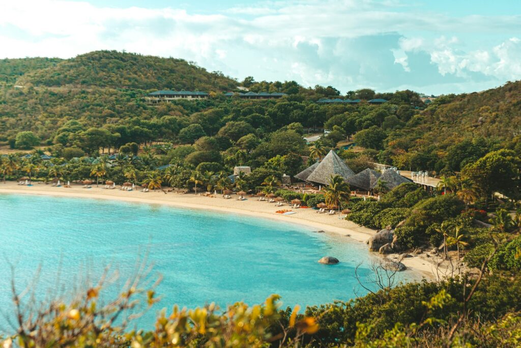 Curving white-sand bay with turquoise water on Virgin Gorda in the British Virgin Islands