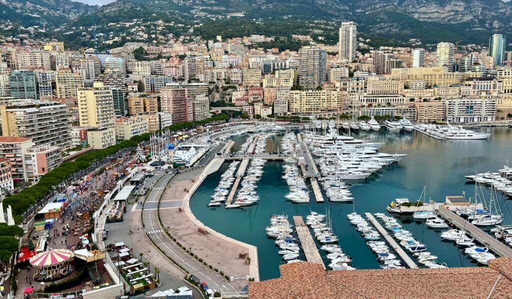 Yacht rental Monaco — Port Hercule with yachts moored beside the Grand Prix circuit